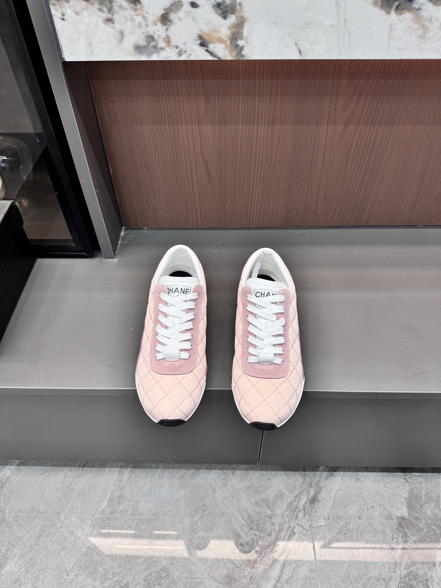 Chanel Black Lambskin Leather Logo Sneakers