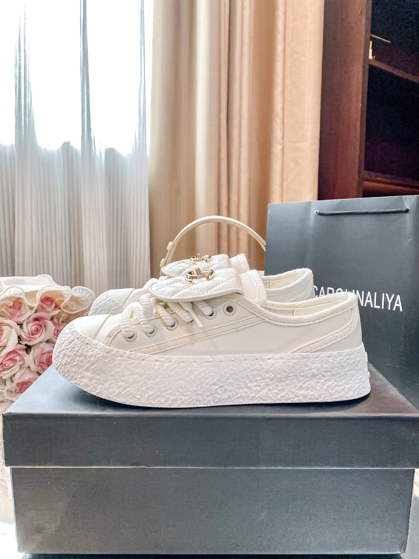 Chanel Black Lambskin Leather Logo Sneakers