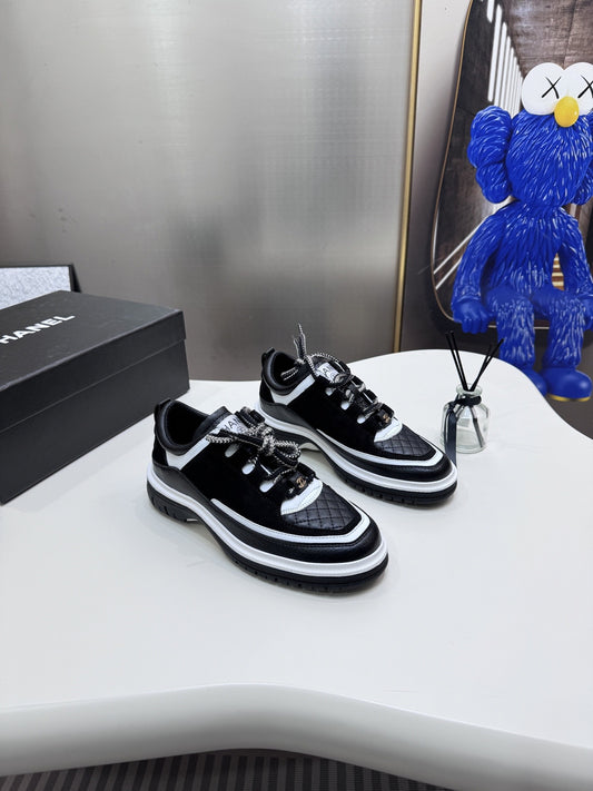 Chanel Leather Logo Sneakers