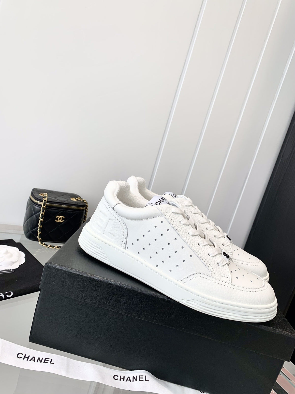 Chanel Logo Sneakers