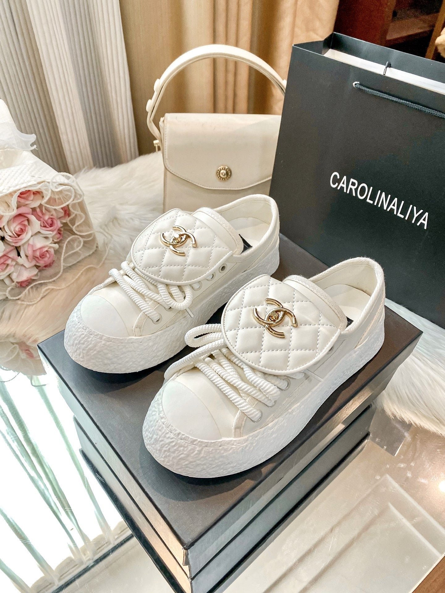 Chanel Black Lambskin Leather Logo Sneakers