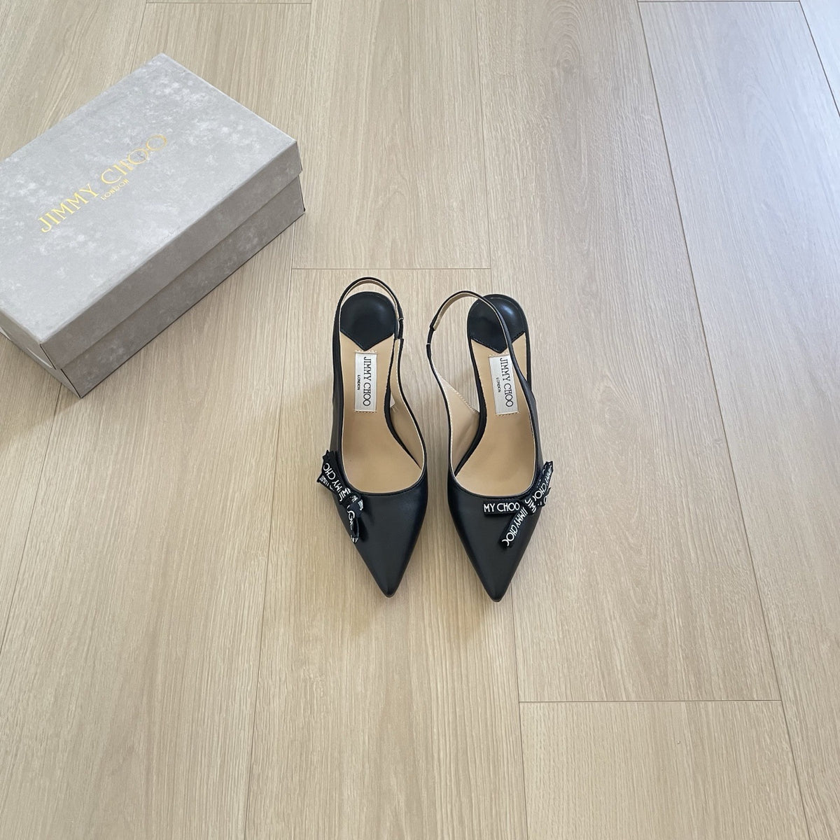 Jimmy Choo Patent Leather Bow Sandals