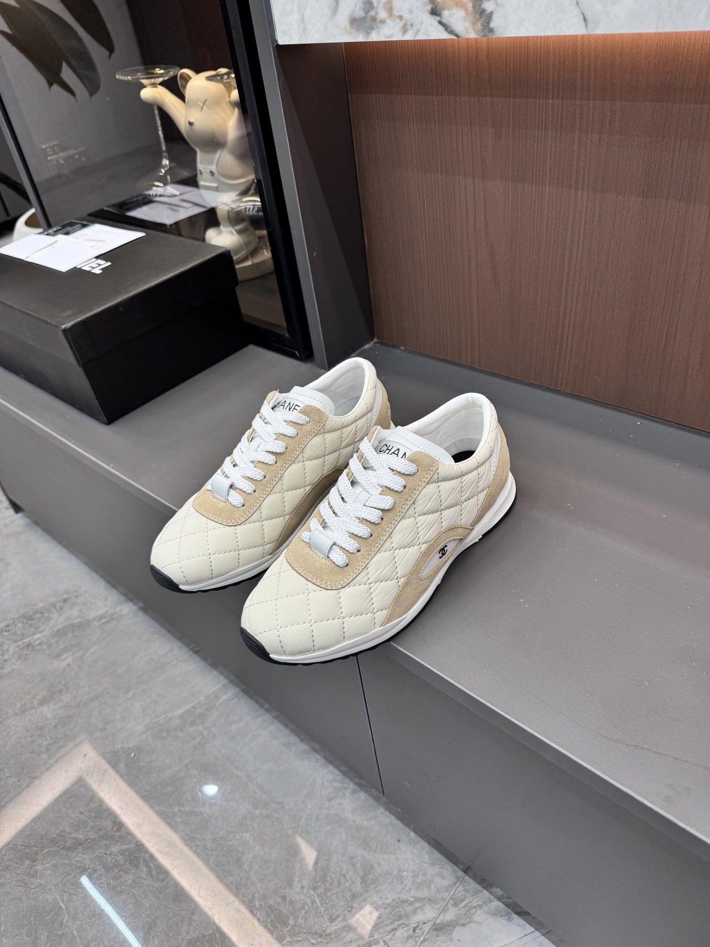 Chanel Black Lambskin Leather Logo Sneakers