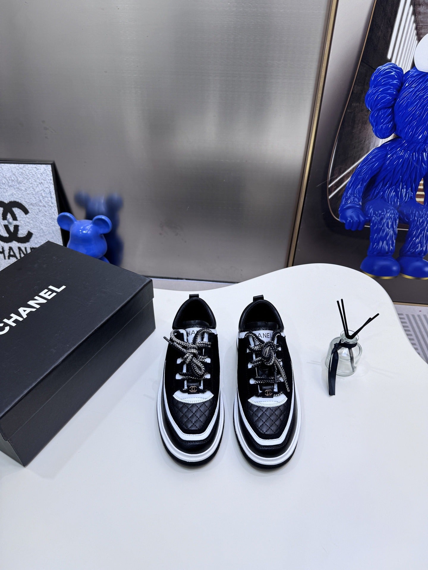 Chanel Leather Logo Sneakers