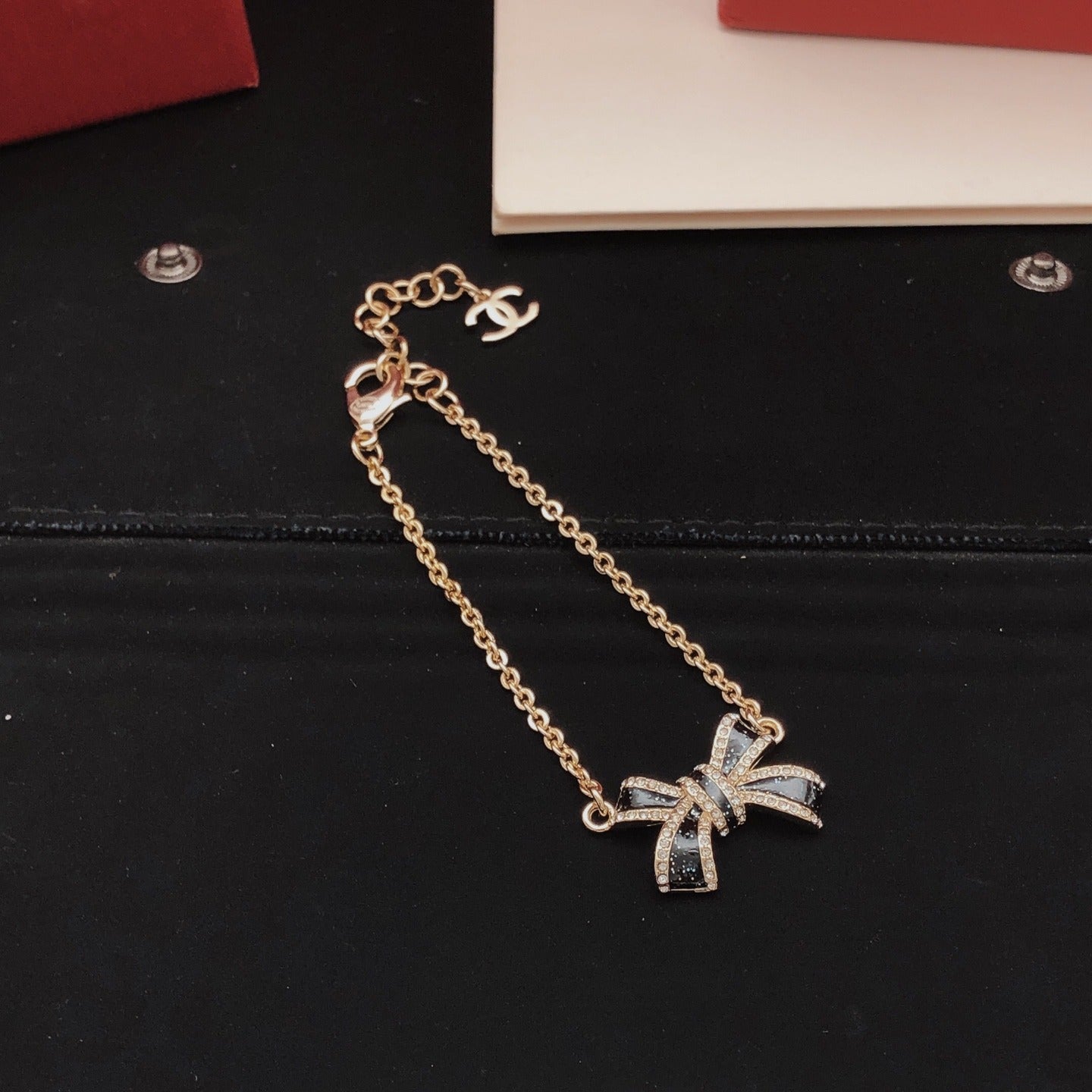 Chanel Black Brass Bow Bracelet