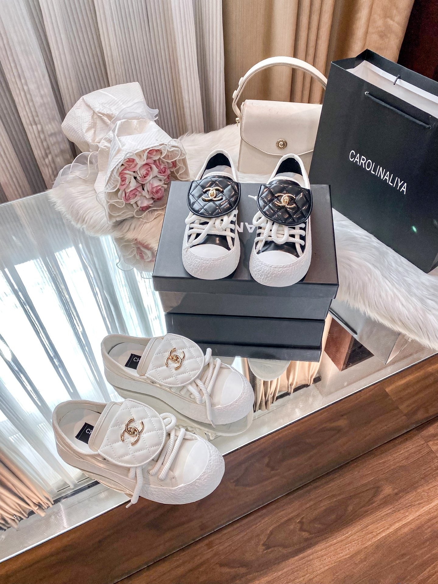Chanel Black Lambskin Leather Logo Sneakers