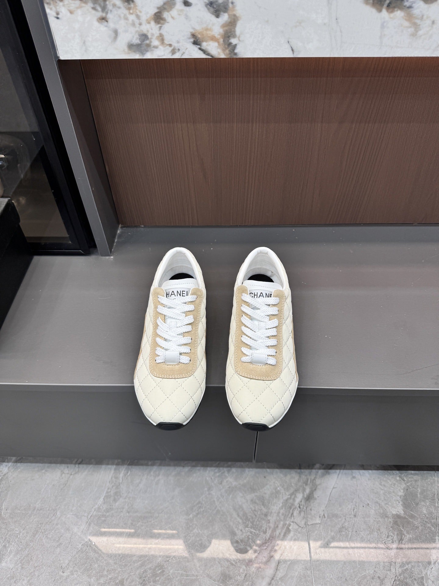 Chanel Black Lambskin Leather Logo Sneakers