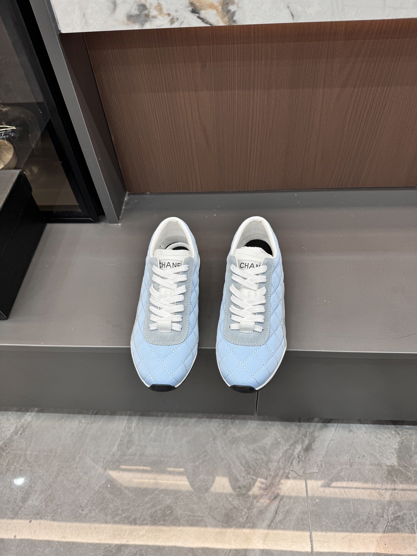 Chanel Black Lambskin Leather Logo Sneakers