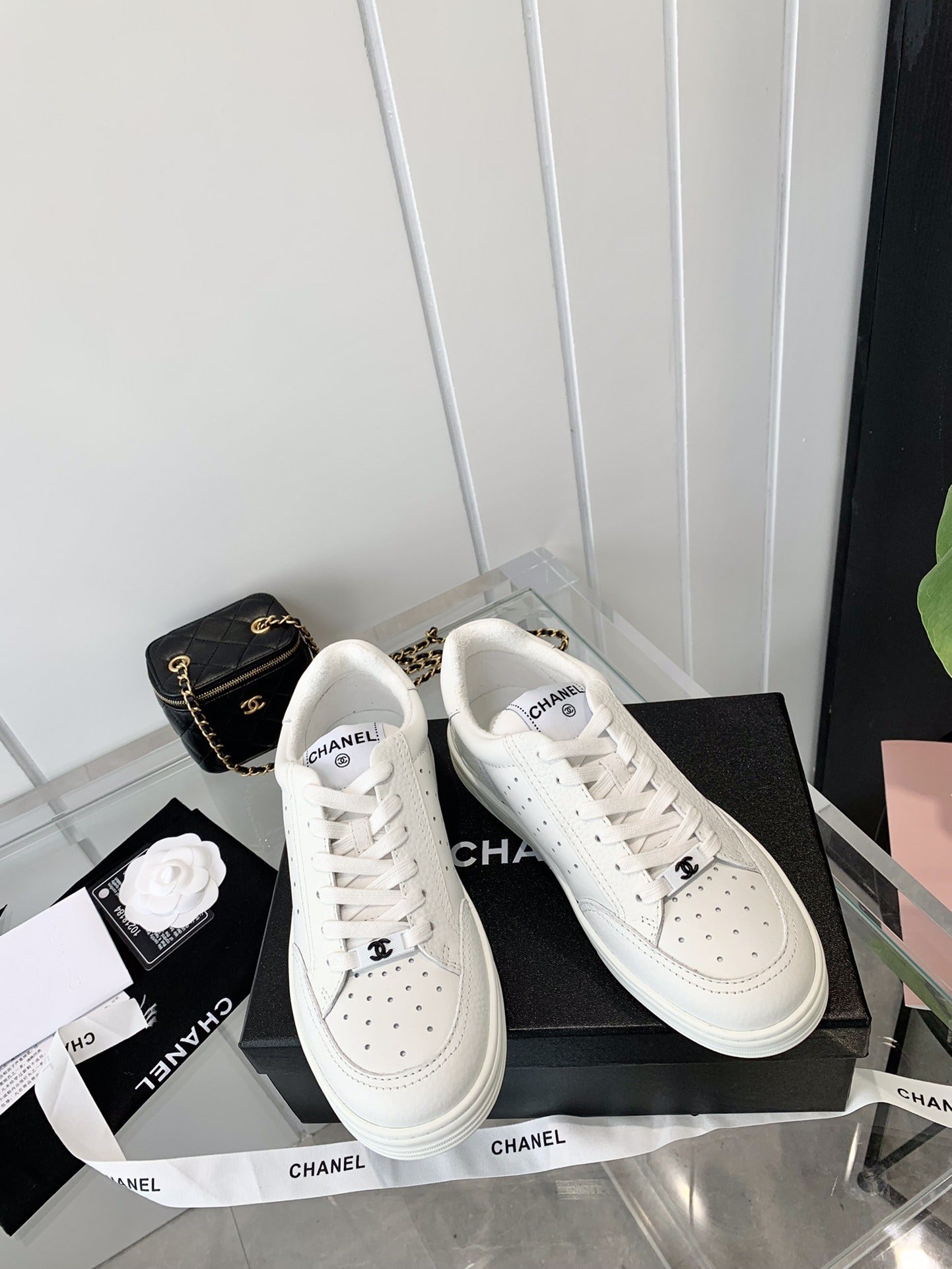 Chanel Logo Sneakers