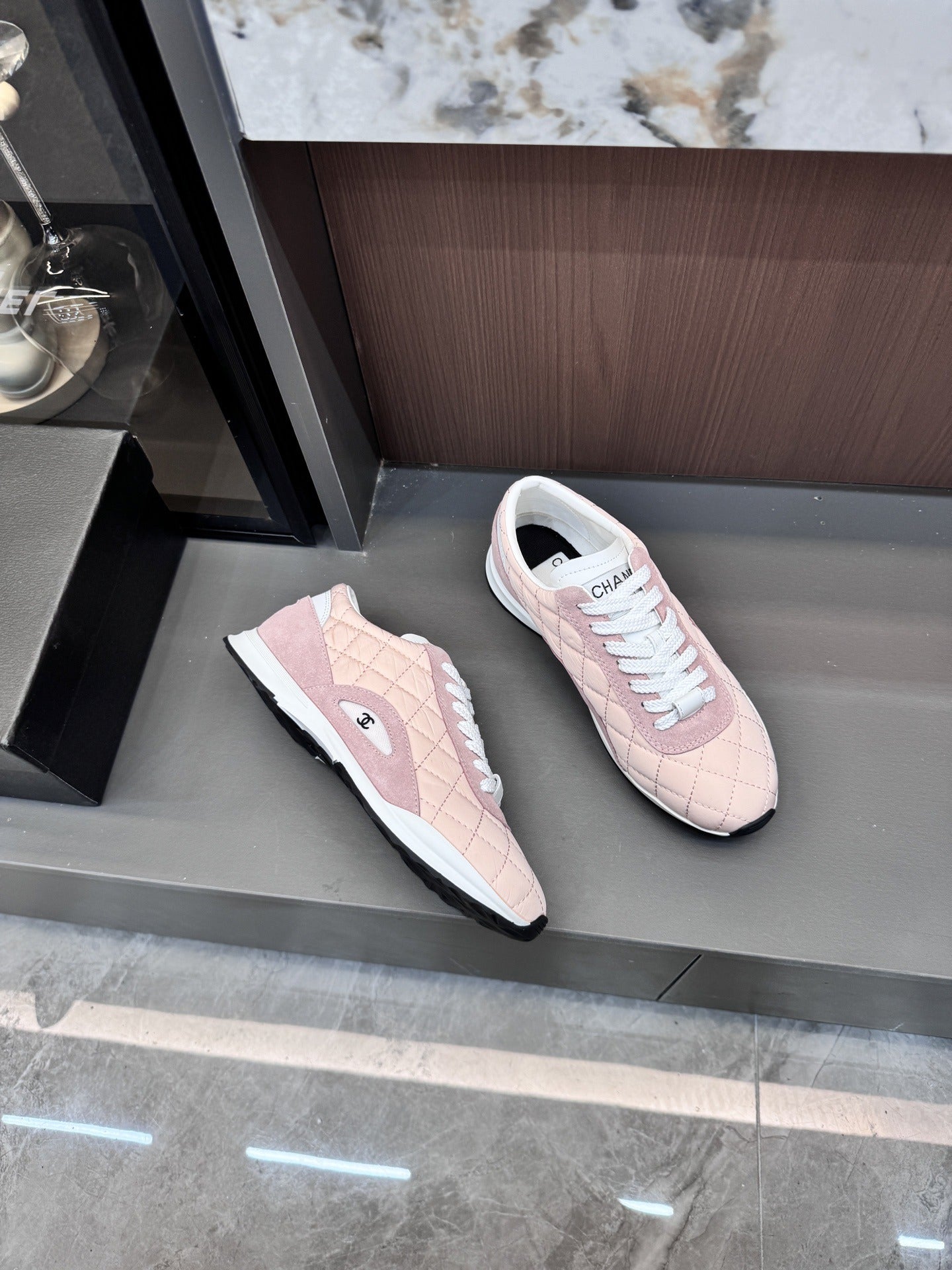 Chanel Black Lambskin Leather Logo Sneakers