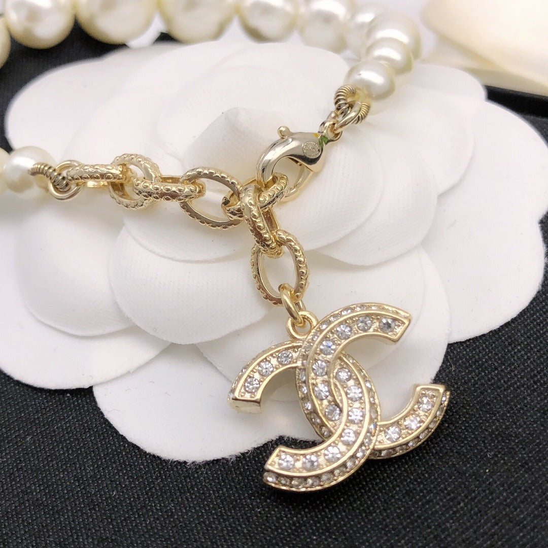Chanel Brass Pearl Necklace