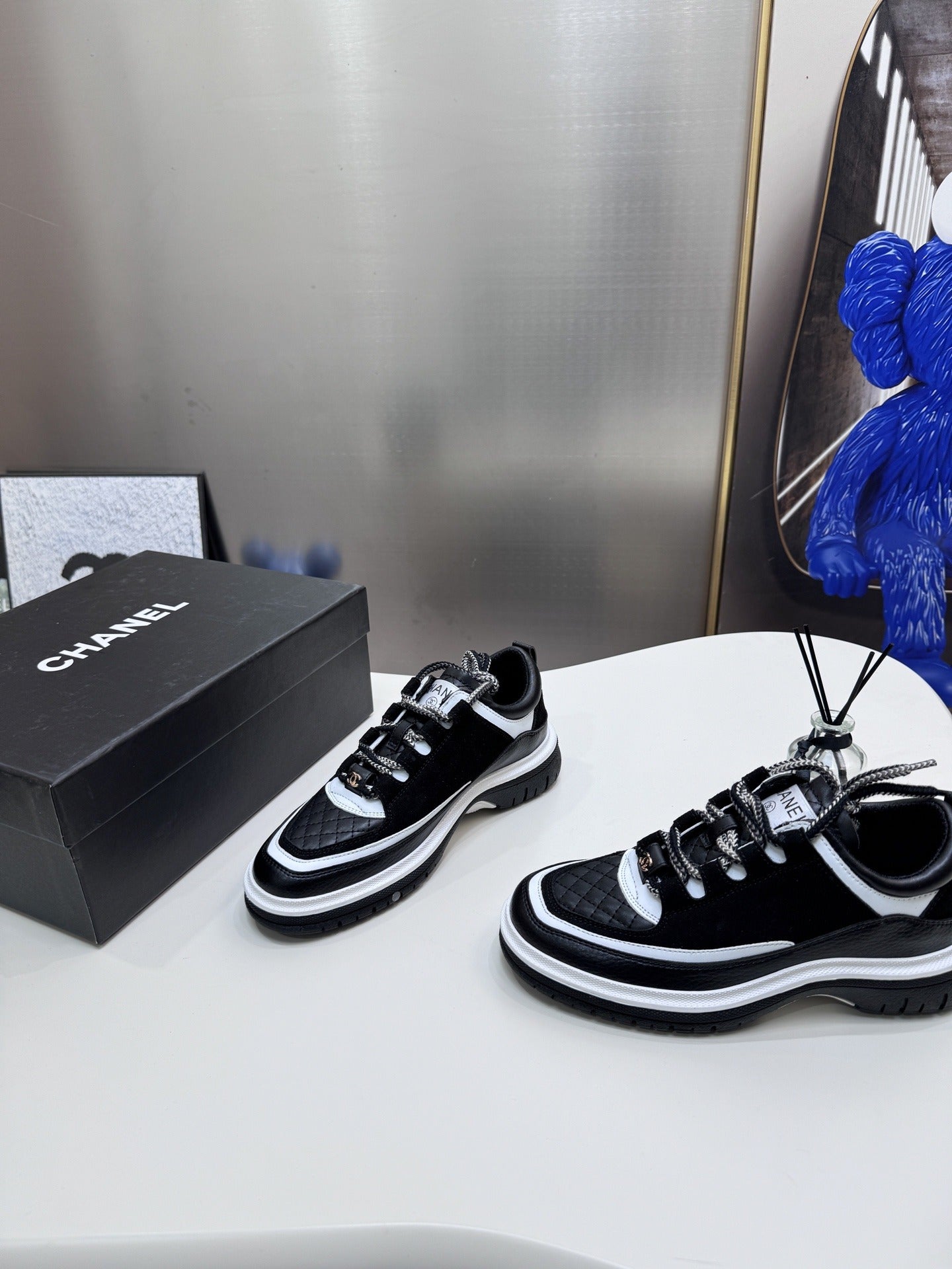 Chanel Leather Logo Sneakers