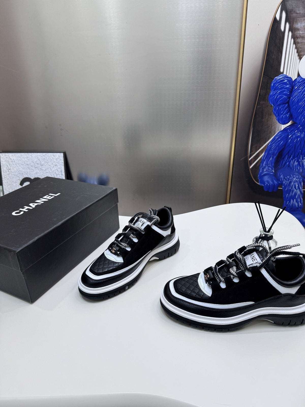 Chanel Leather Logo Sneakers