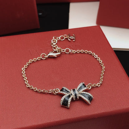 Chanel Black Brass Bow Bracelet