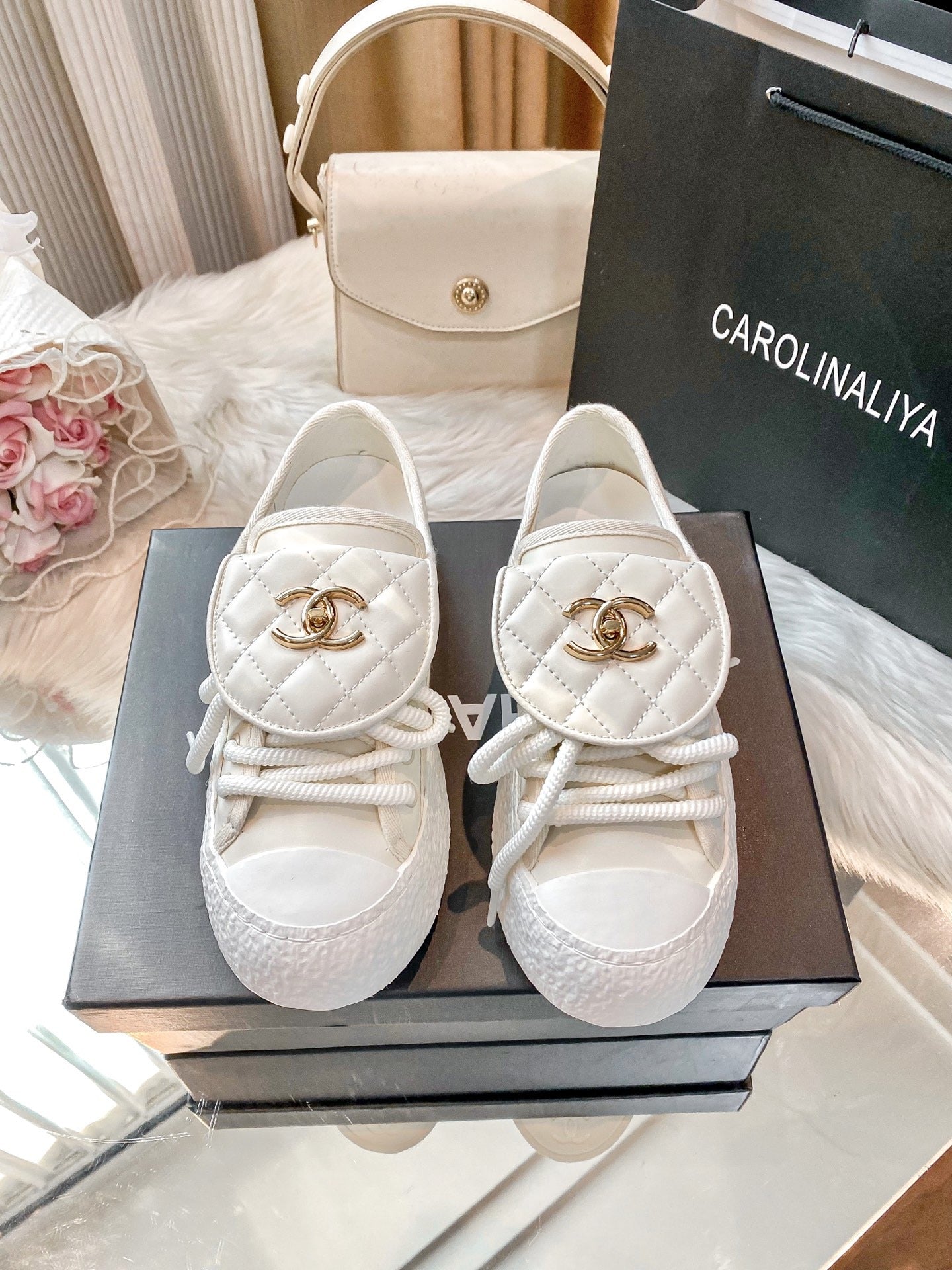 Chanel Black Lambskin Leather Logo Sneakers