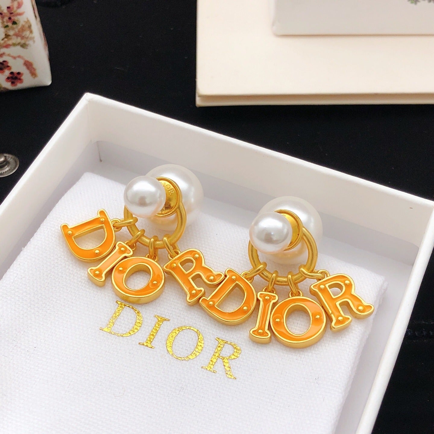 Dior Orange Brass Logo Earrings