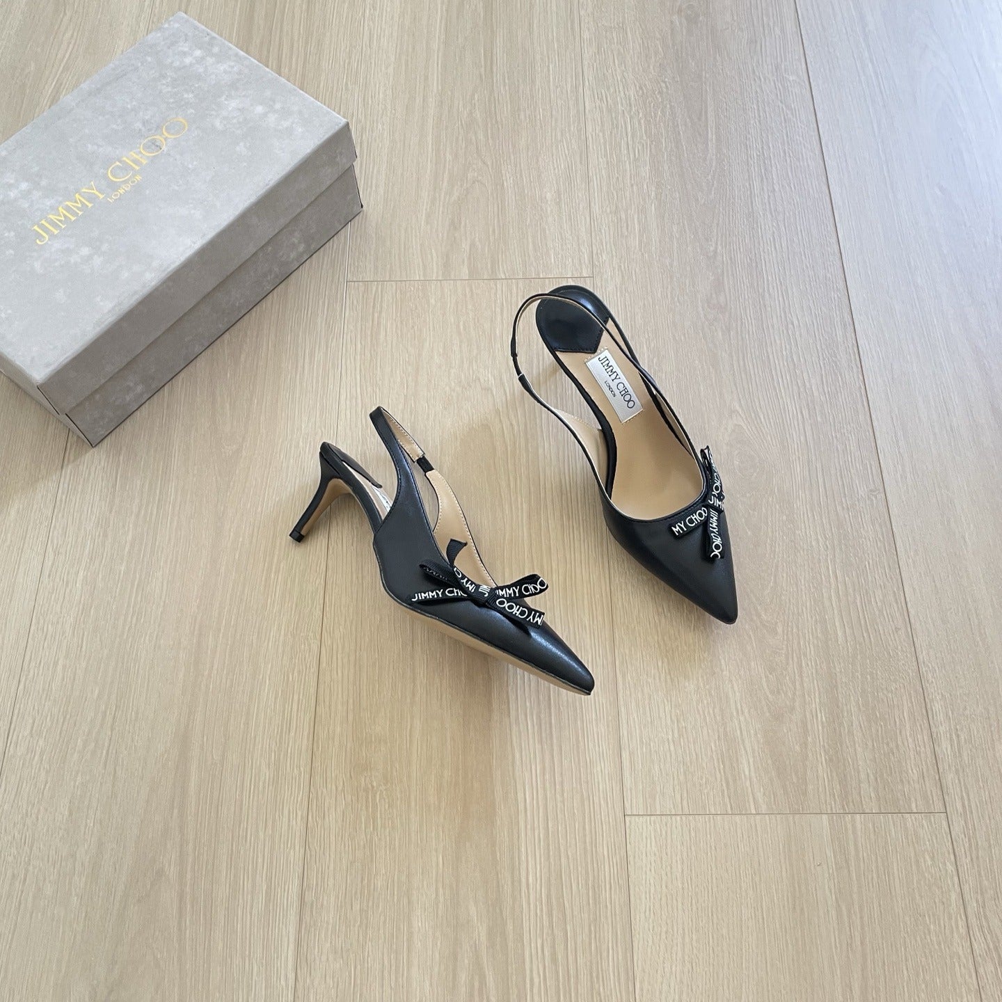 Jimmy Choo Patent Leather Bow Sandals
