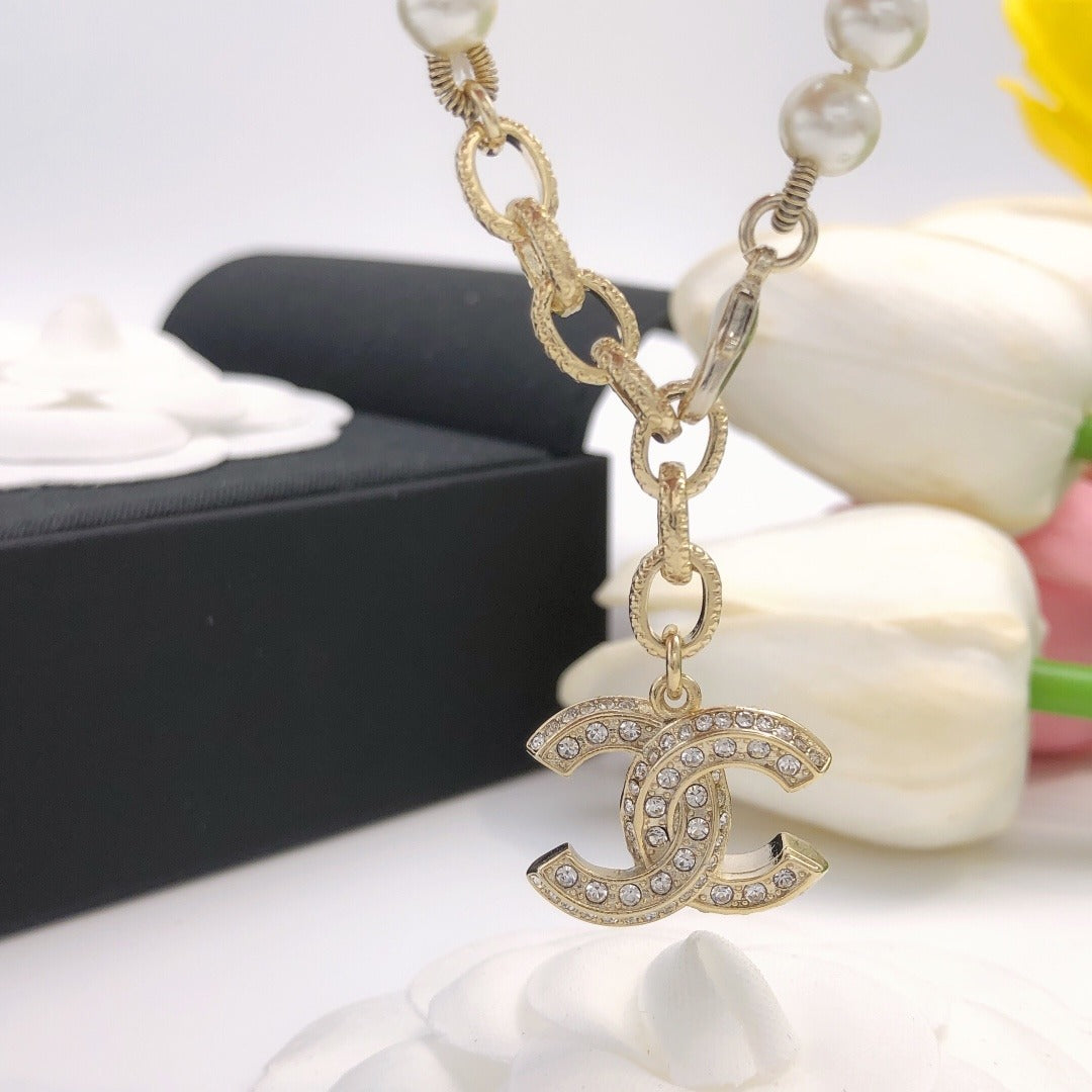 Chanel Brass Pearl Necklace