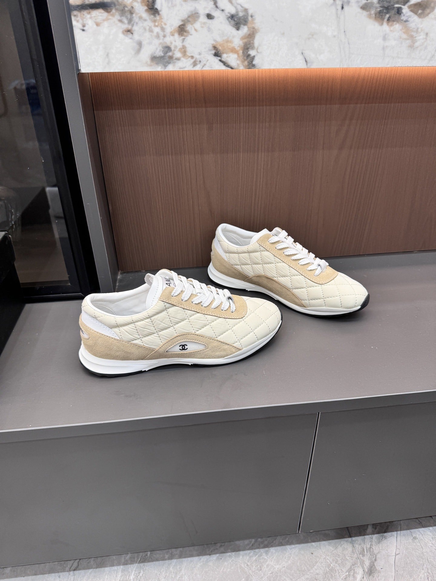 Chanel Black Lambskin Leather Logo Sneakers