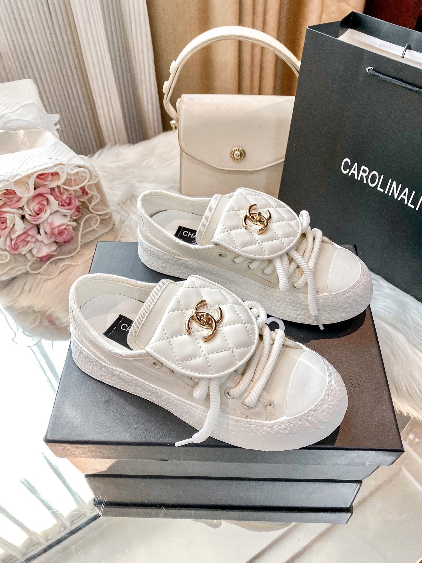 Chanel Black Lambskin Leather Logo Sneakers