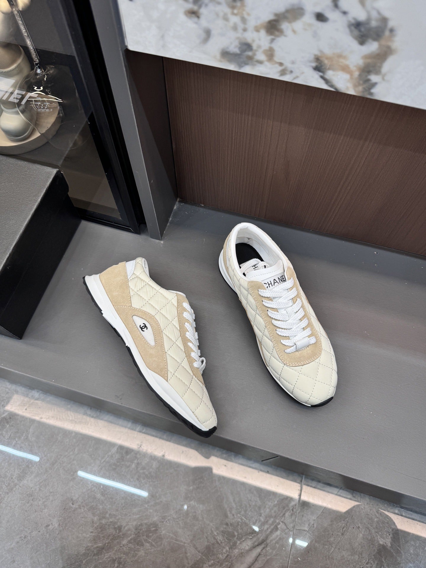 Chanel Black Lambskin Leather Logo Sneakers