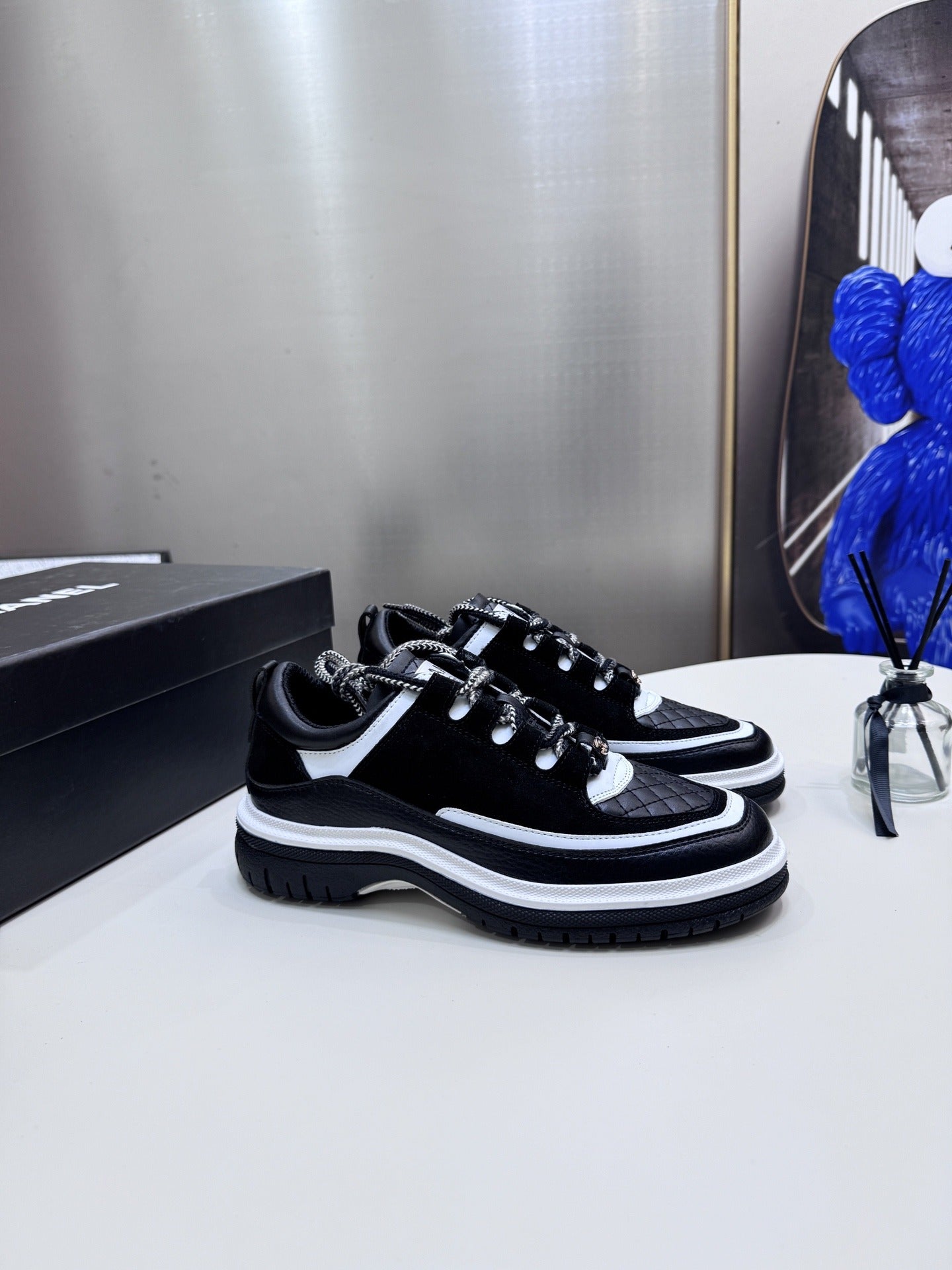 Chanel Leather Logo Sneakers