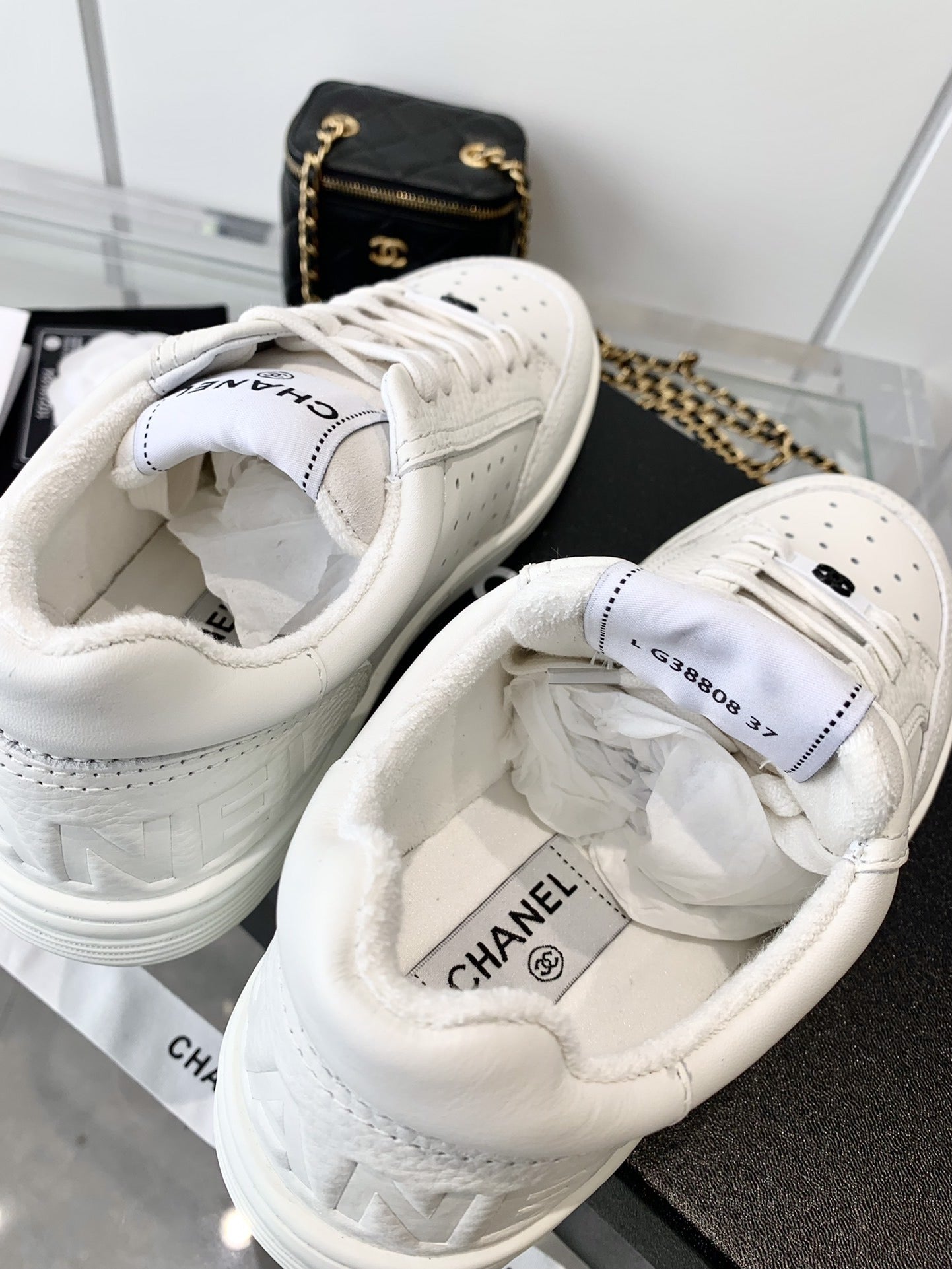 Chanel Logo Sneakers