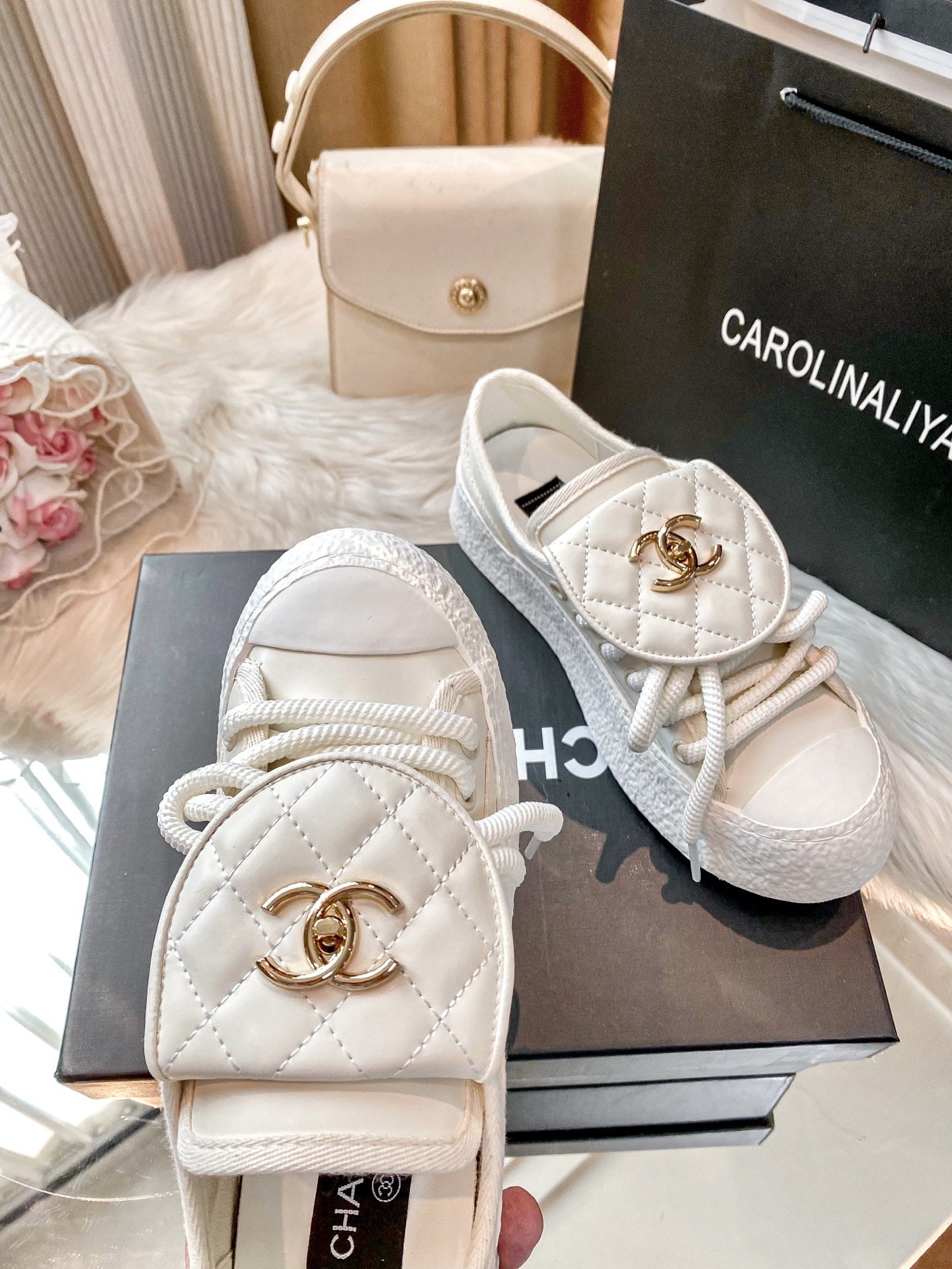 Chanel Black Lambskin Leather Logo Sneakers
