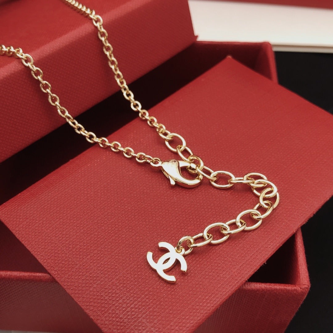 Chanel Brass Bow Necklace