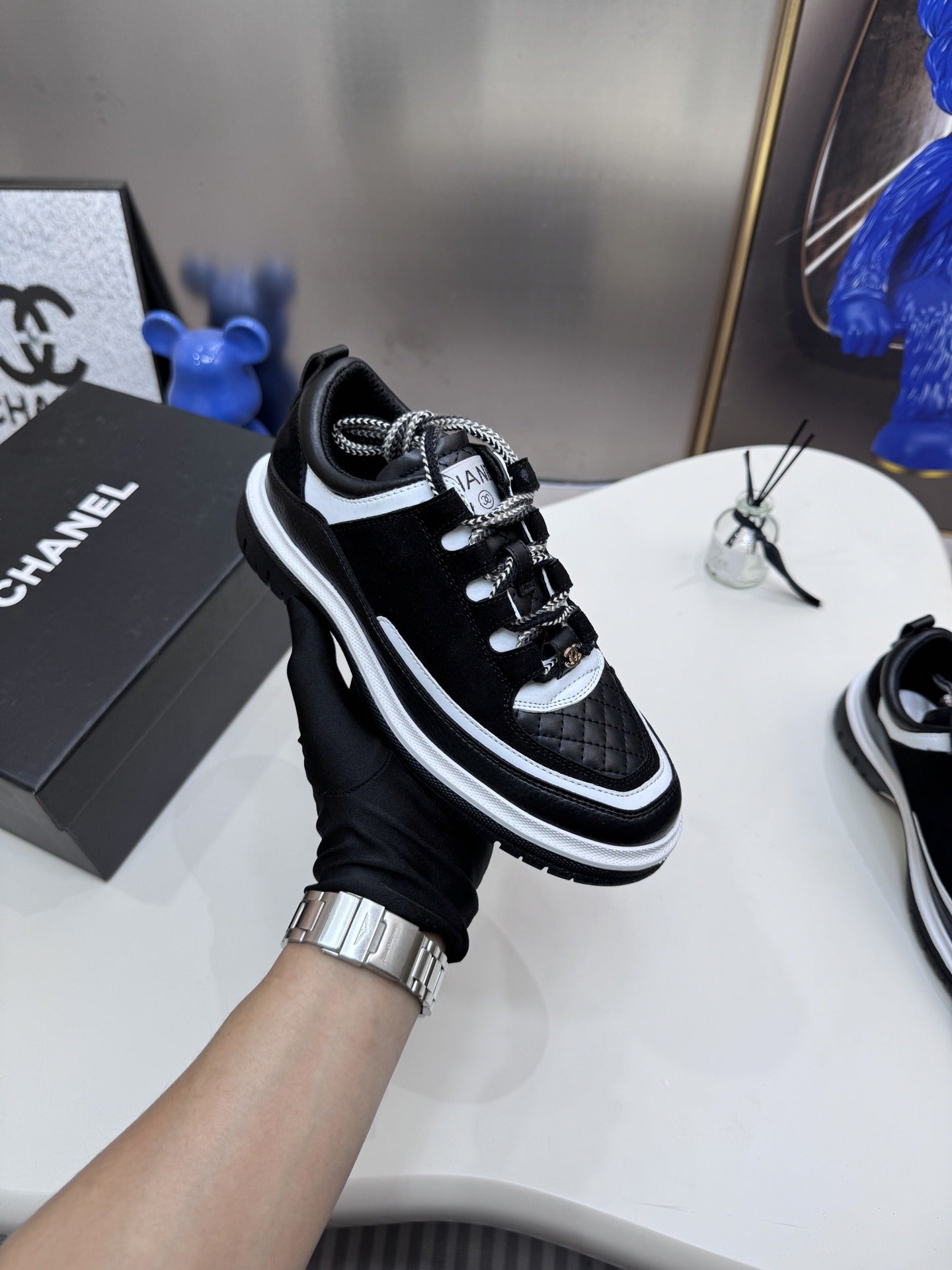 Chanel Leather Logo Sneakers
