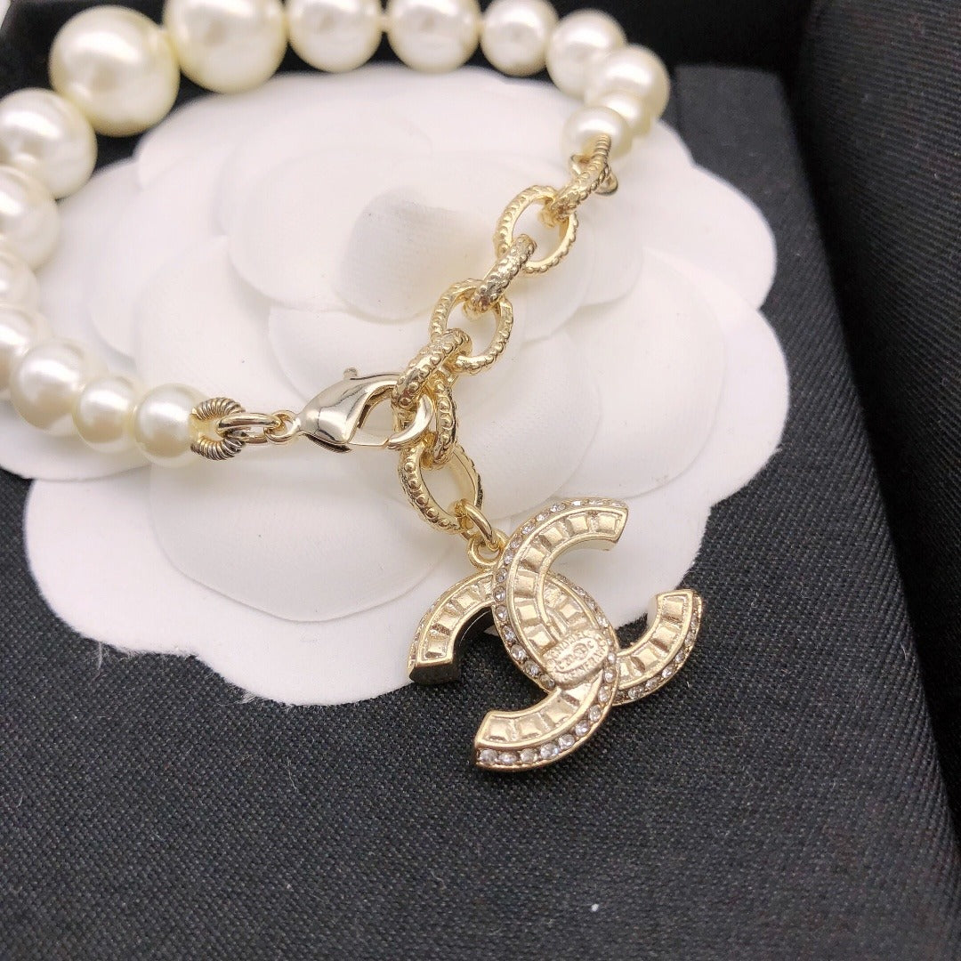 Chanel Brass Pearl Necklace