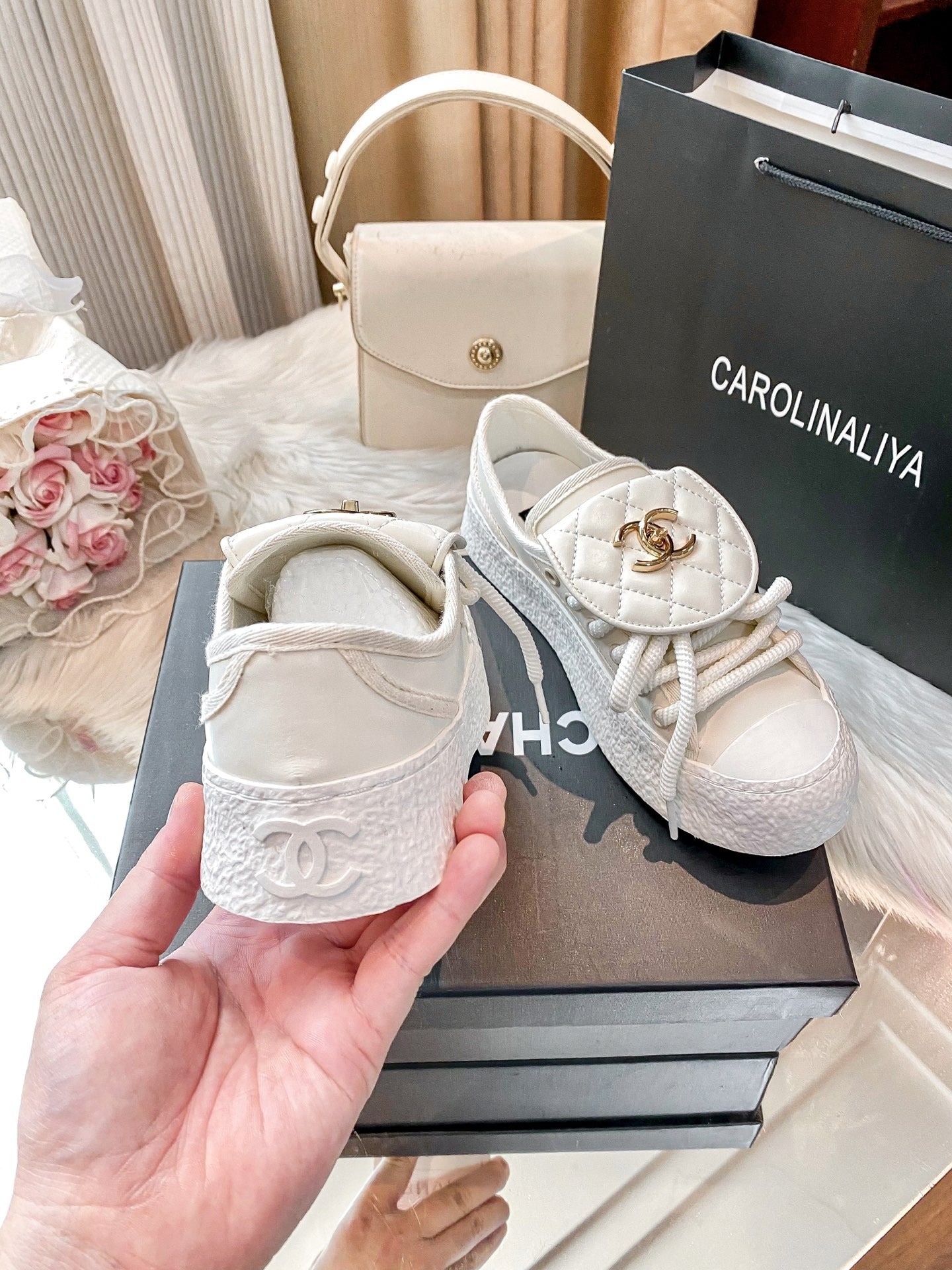 Chanel Black Lambskin Leather Logo Sneakers