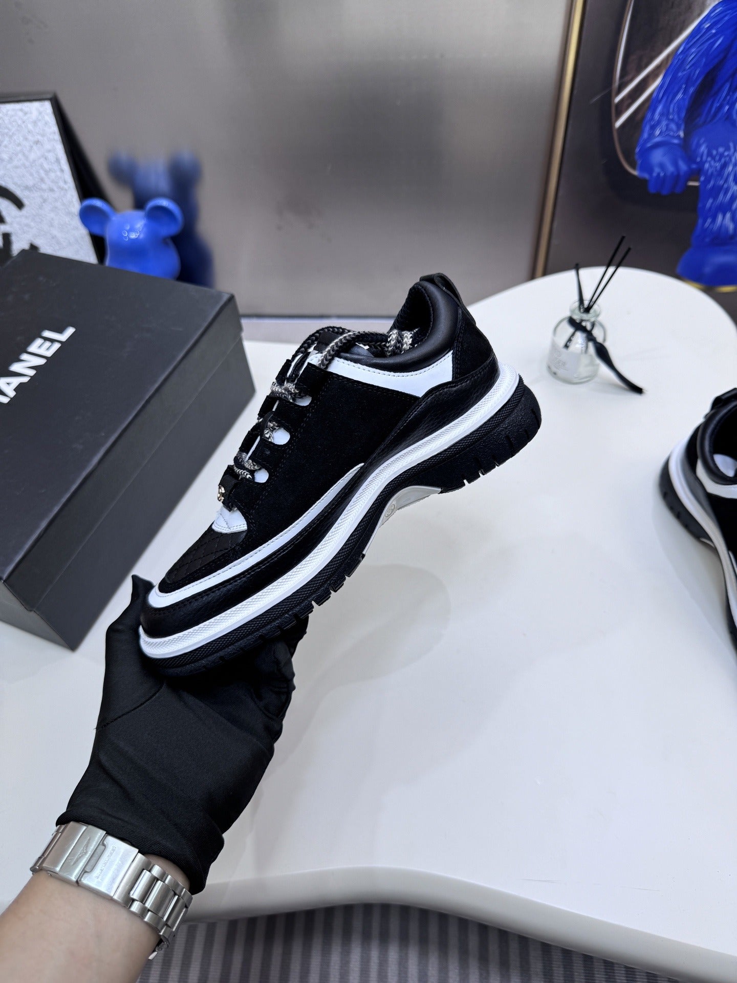 Chanel Leather Logo Sneakers